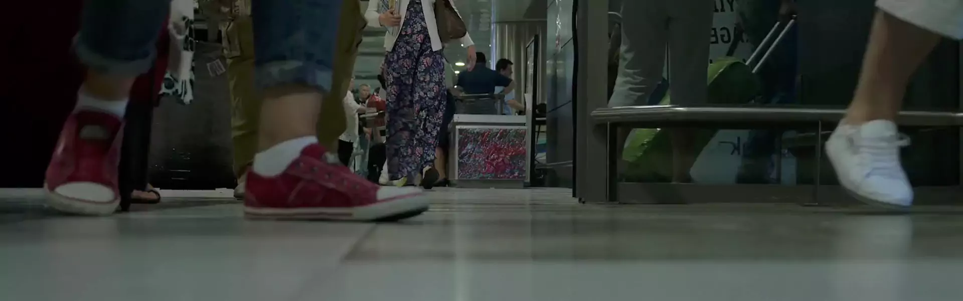 people's feet walking over store floor