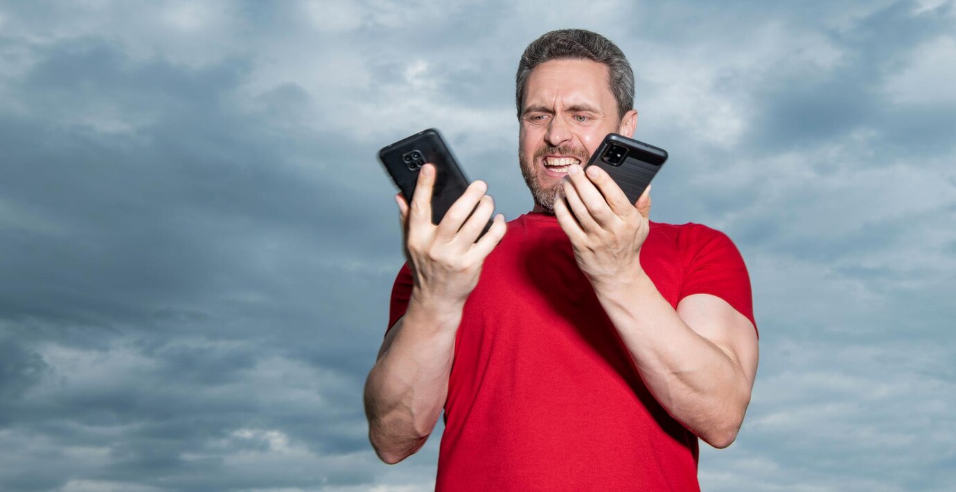 man-shouting-has-phone-talk-sky-background-man-has-phone-talk-outdoor_474717-132318